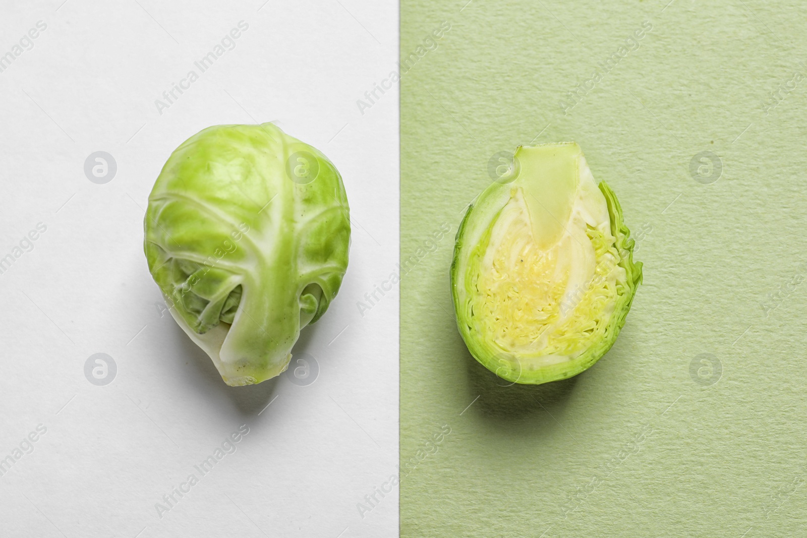 Photo of Tasty fresh Brussels sprouts on color background, top view