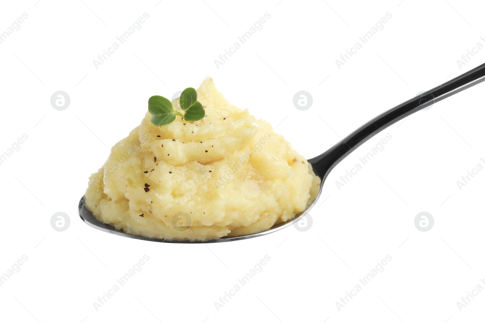 Photo of Spoon of tasty mashed potatoes with microgreen and black pepper isolated on white