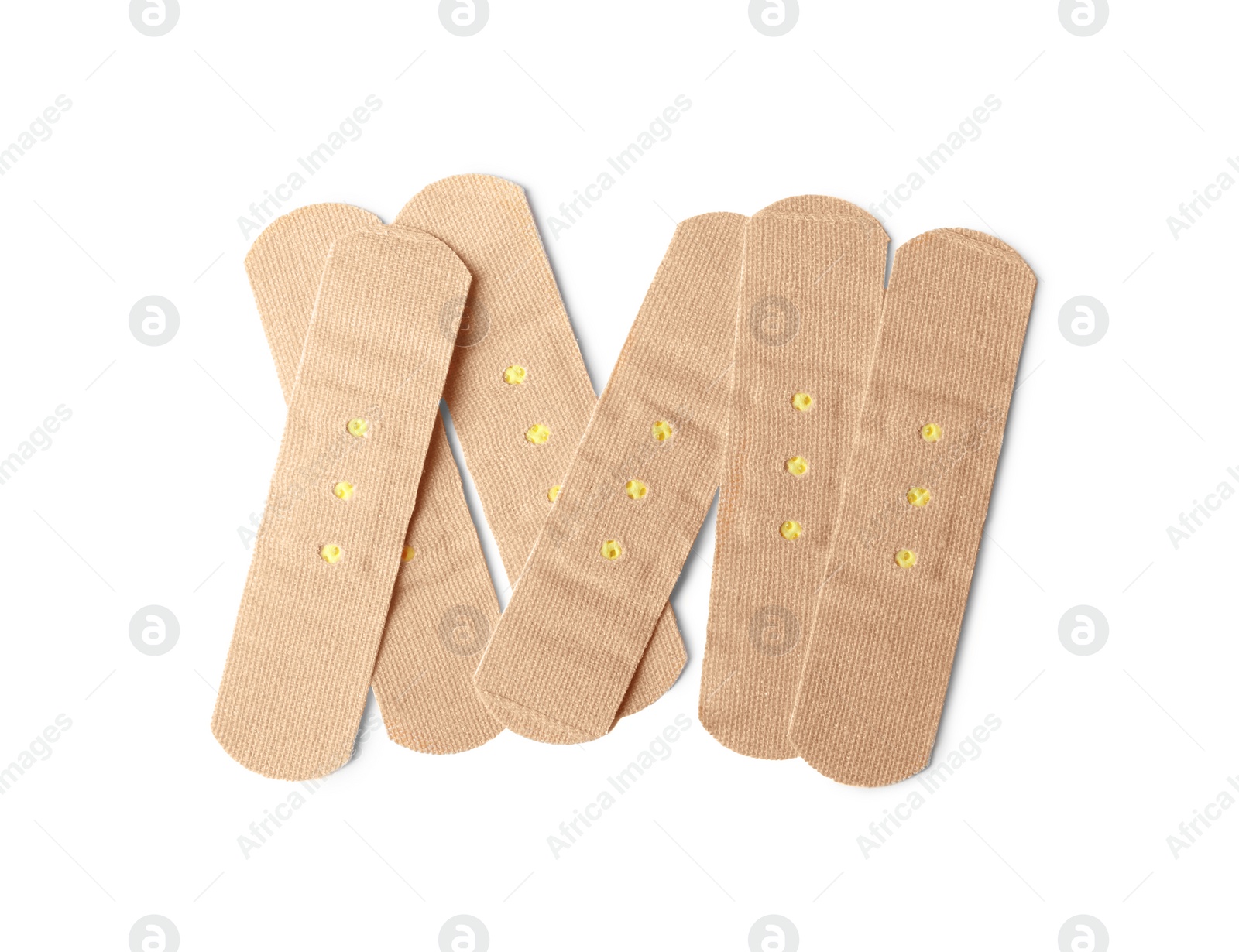 Medical sticking plasters isolated on white. First aid item Photo of Medical sticking plasters isolated on white. First aid item
