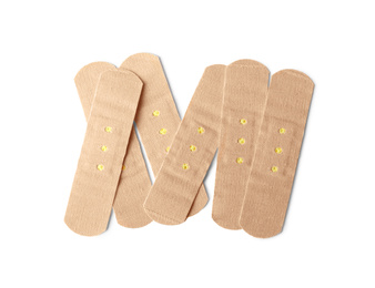 Photo of Medical sticking plasters isolated on white. First aid item
