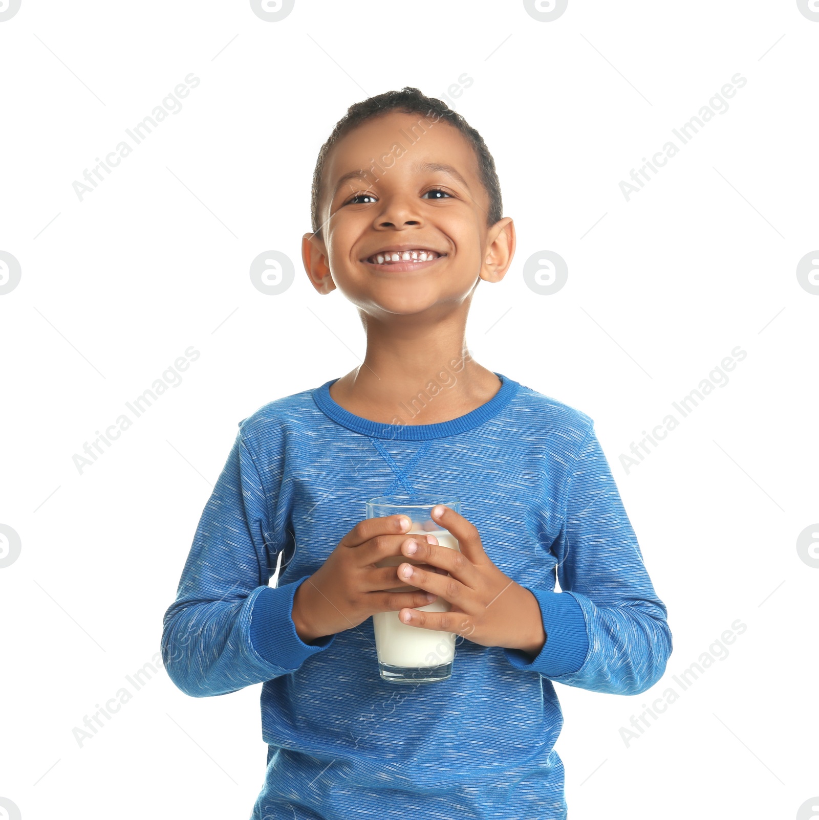 Photo of Adorable African-American boy with glass of milk on white background