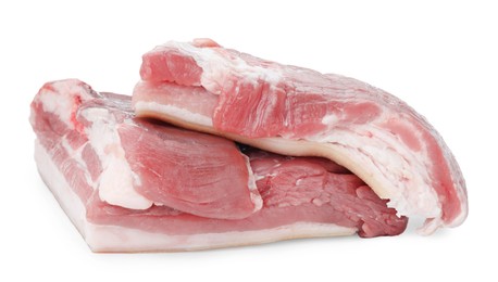 Photo of Pieces of raw pork belly isolated on white