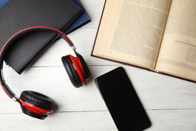 Photo of Flat lay composition with books on white wooden table