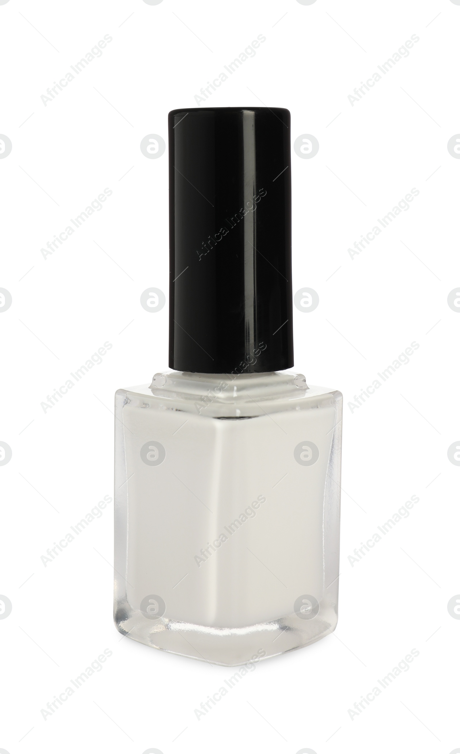 Photo of Beautiful nail polish in bottle isolated on white