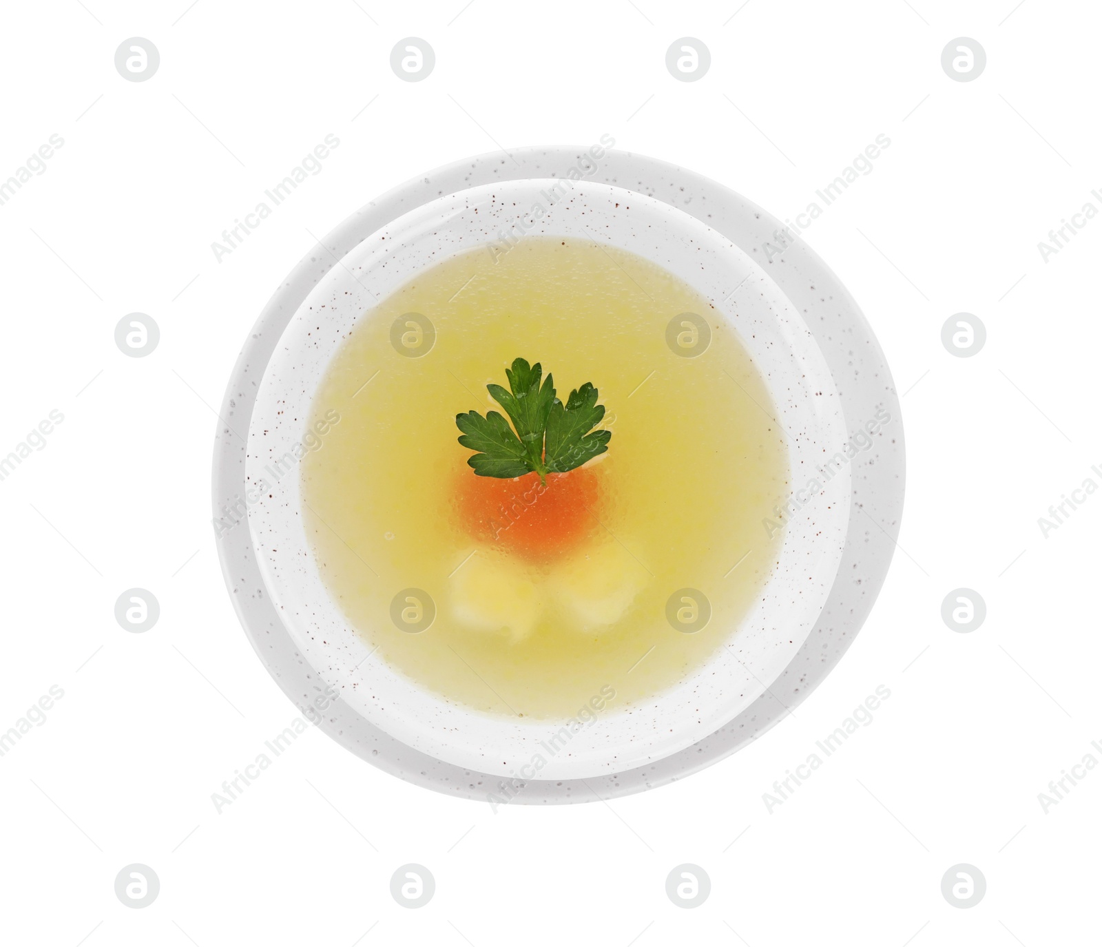 Photo of Tasty soup with vegetables and parsley in bowl isolated on white, top view