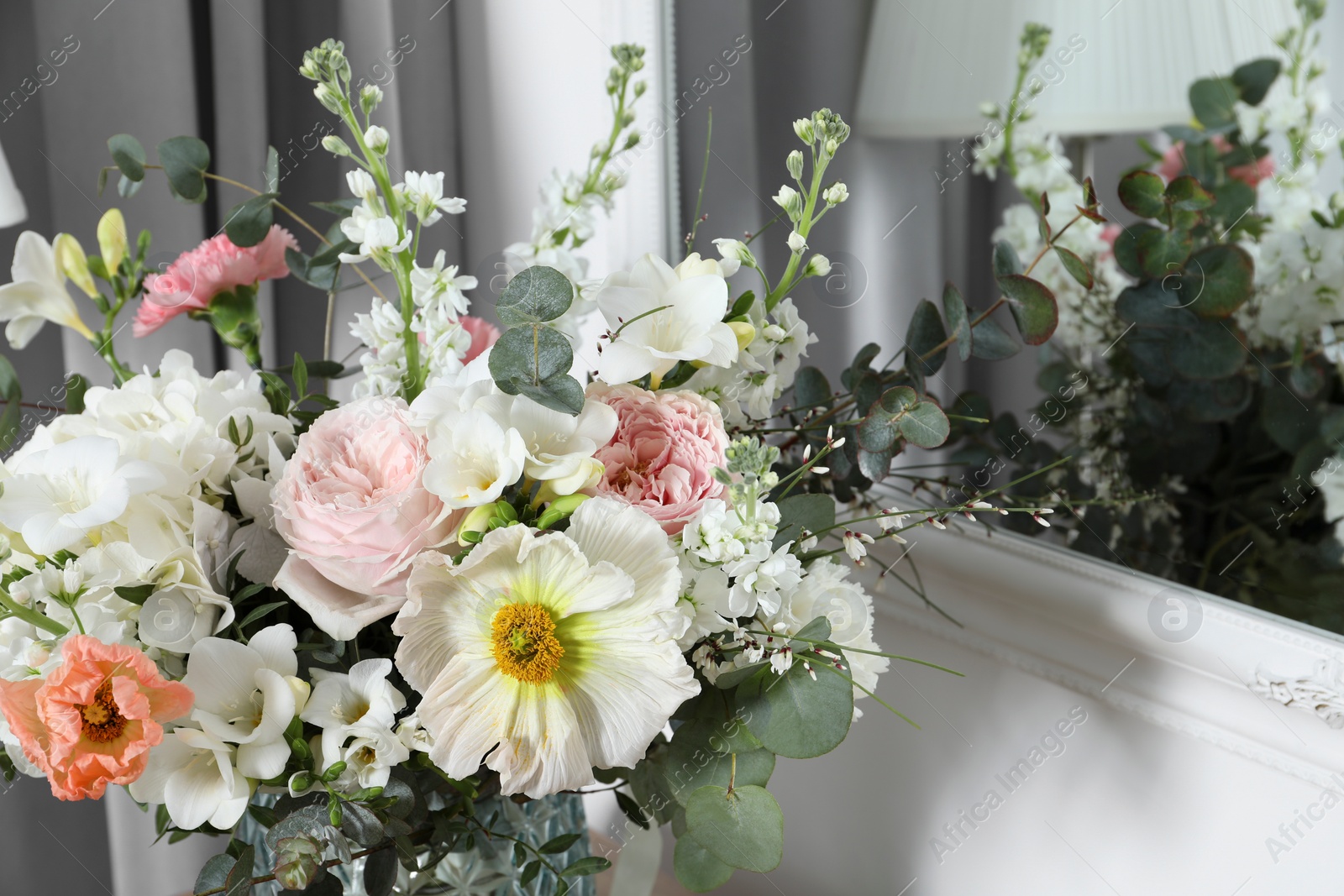 Photo of Beautiful bouquet of different fresh flowers indoors, closeup