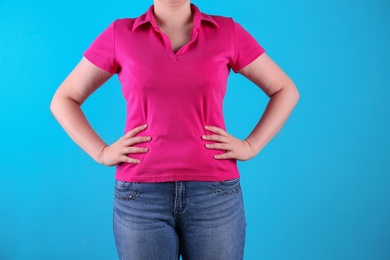 Overweight woman before weight loss on color background