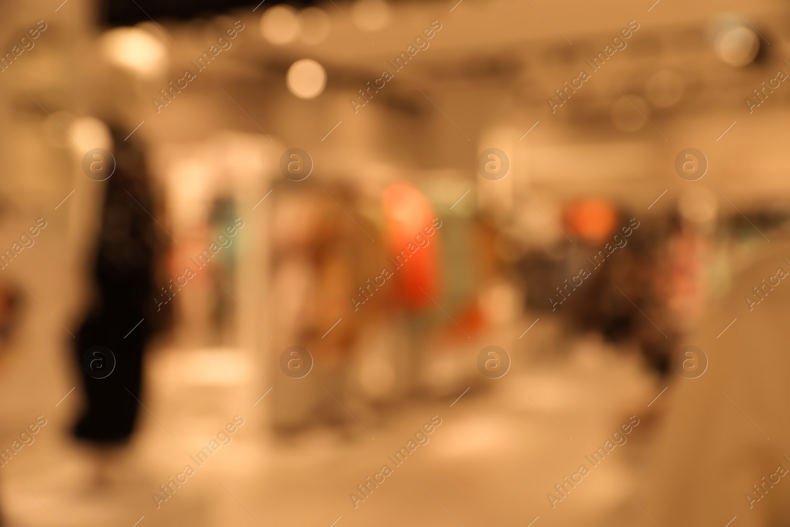 Photo of Blurred view of store interior in shopping mall. Bokeh effect