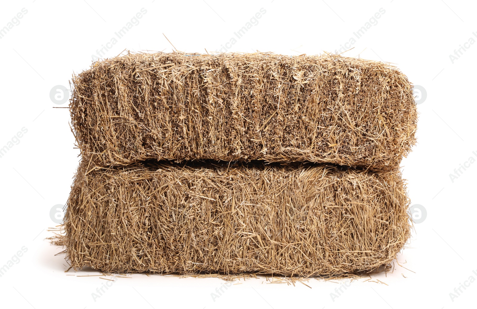 Photo of Bales of dried straw isolated on white