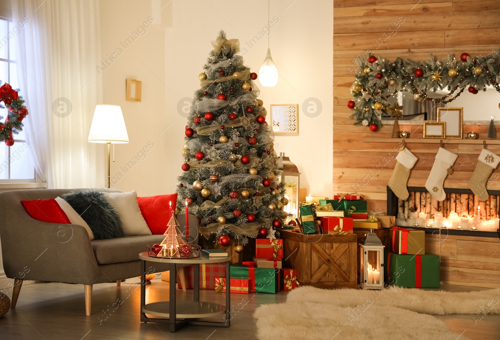 Image of Beautiful Christmas tree in living room. Festive interior