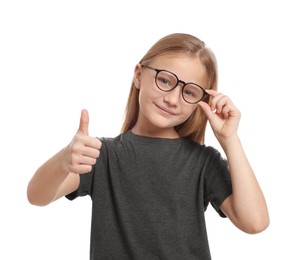Photo of Cute girl in glasses showing thumb up on white background