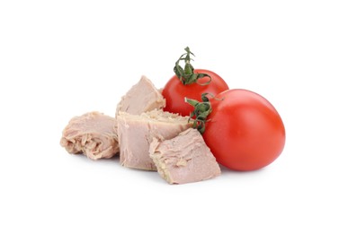 Photo of Delicious canned tuna chunks with tomatoes on white background