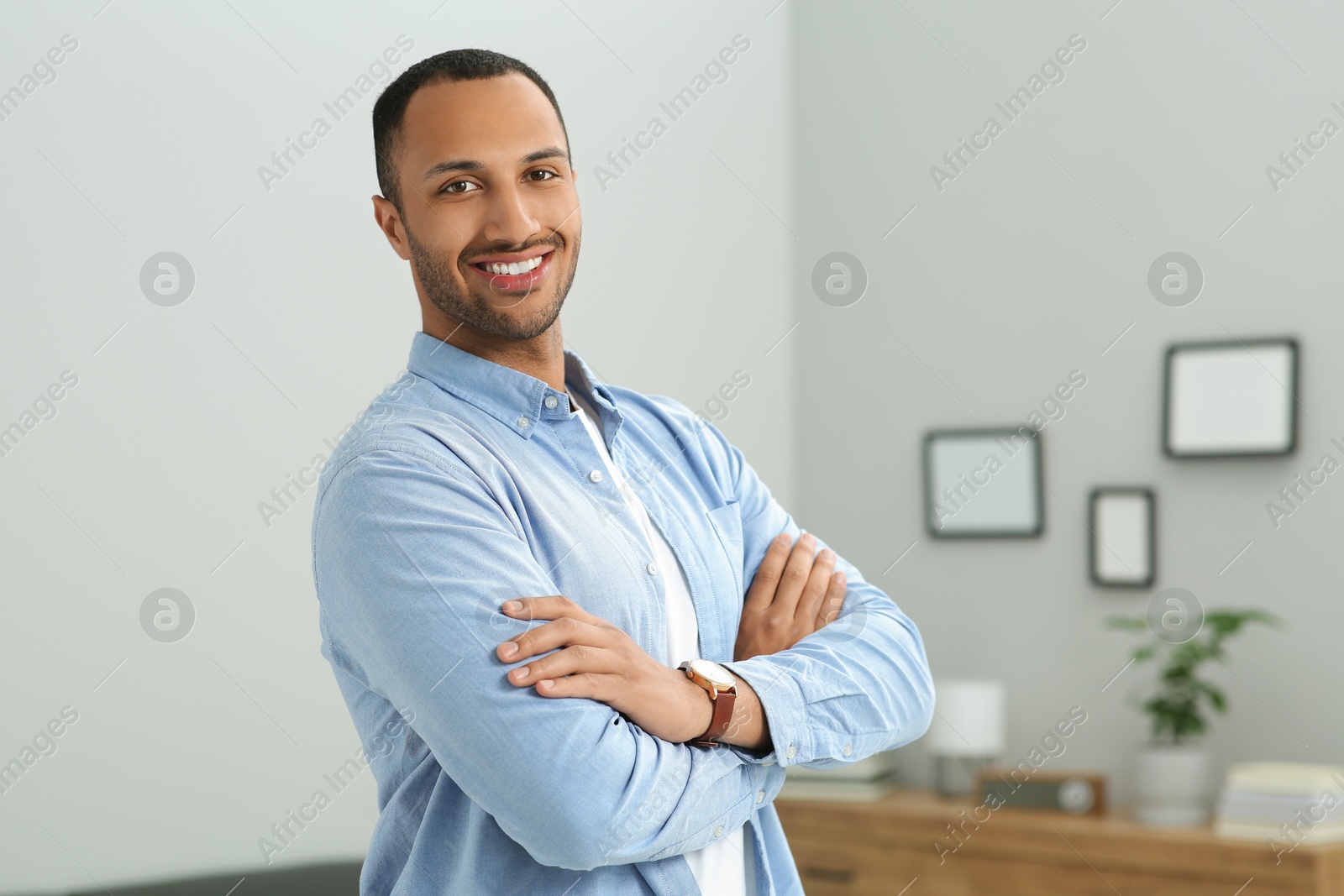 Photo of Portrait of handsome young man at home