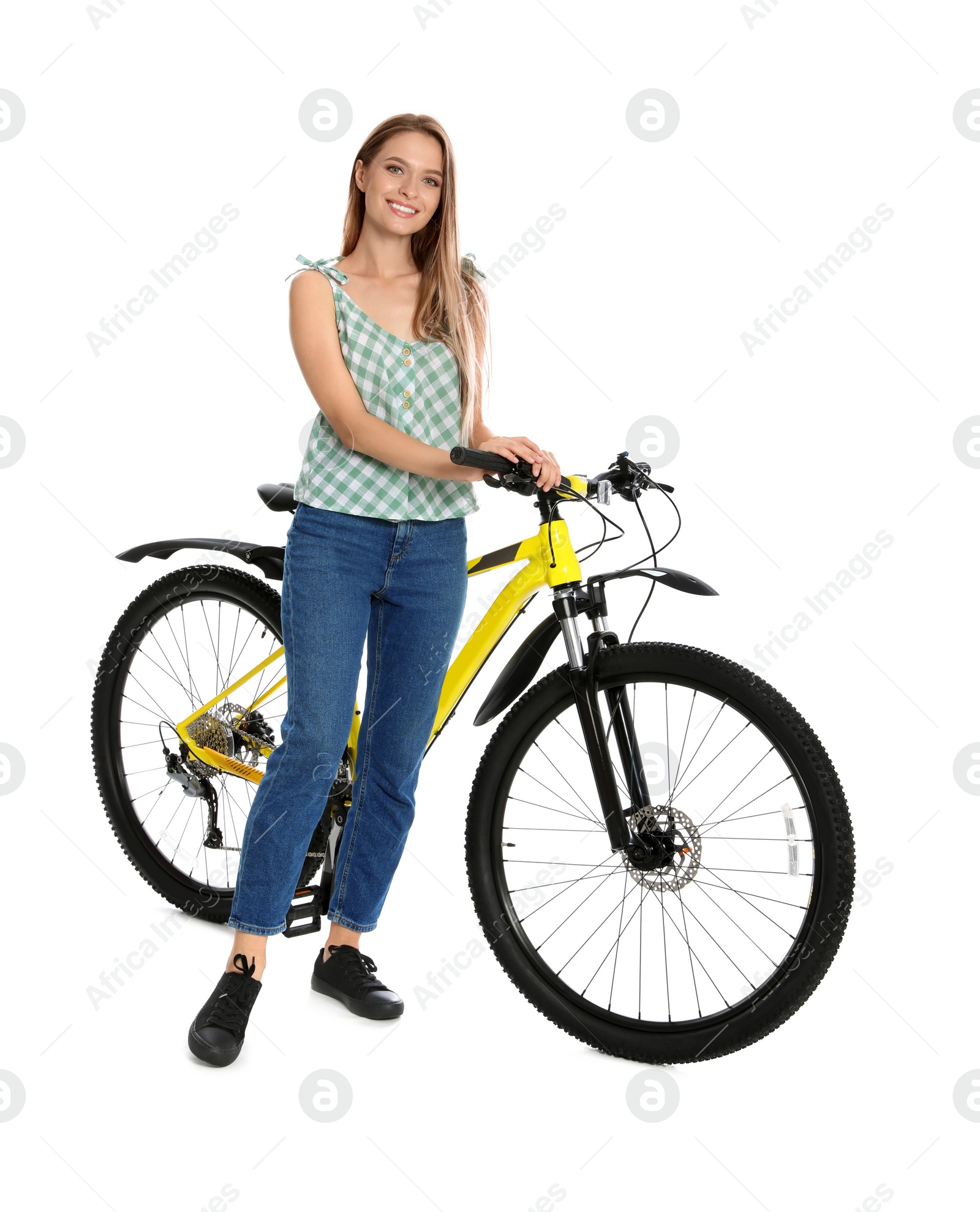 Photo of Happy young woman with bicycle on white background