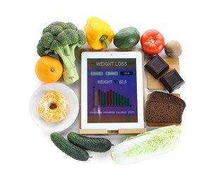 Photo of Tablet with weight loss calculator application and food products on white background, top view
