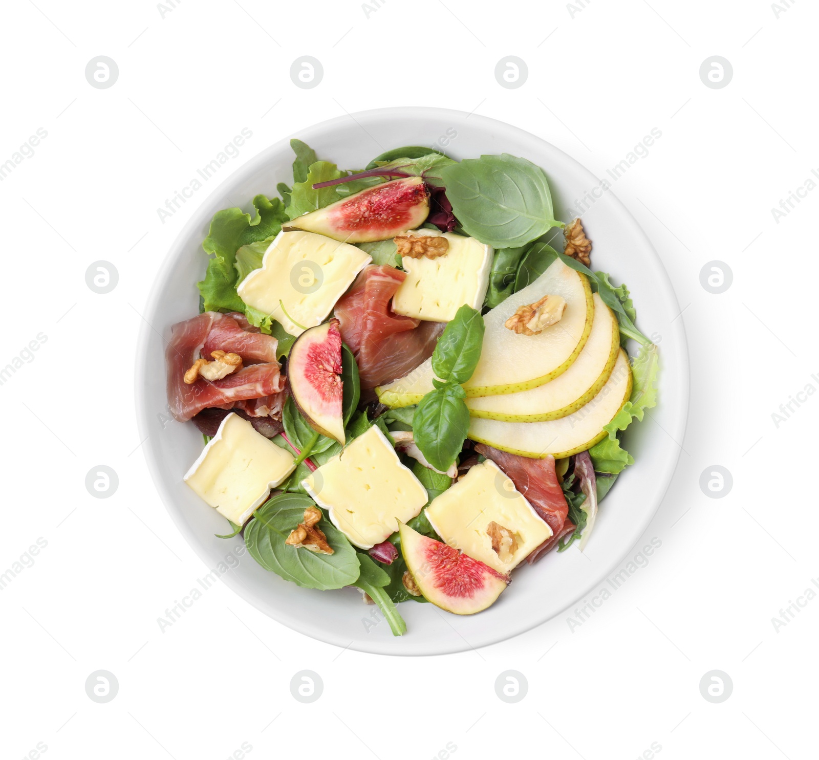 Photo of Tasty salad with brie cheese, prosciutto, pear and figs isolated on white, top view