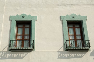 Photo of Exterior of building with windows and balconies