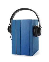 Photo of Modern headphones with hardcover books on white background