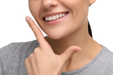 Photo of Woman with clean teeth smiling on white background, closeup