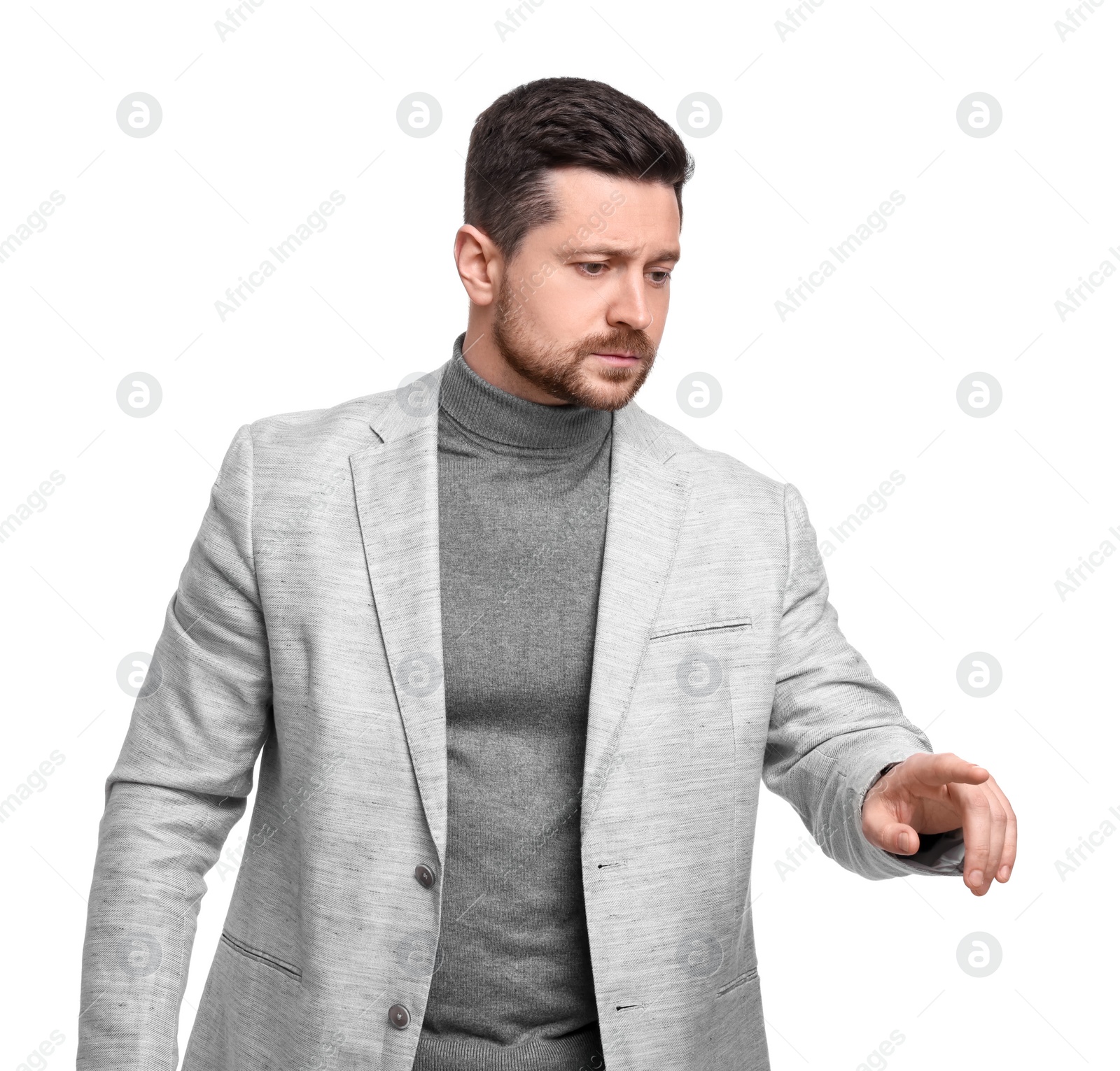 Photo of Handsome bearded businessman in suit on white background