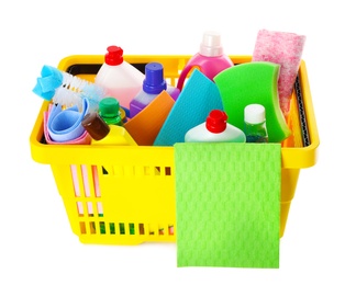 Yellow shopping basket with different household chemicals on white background