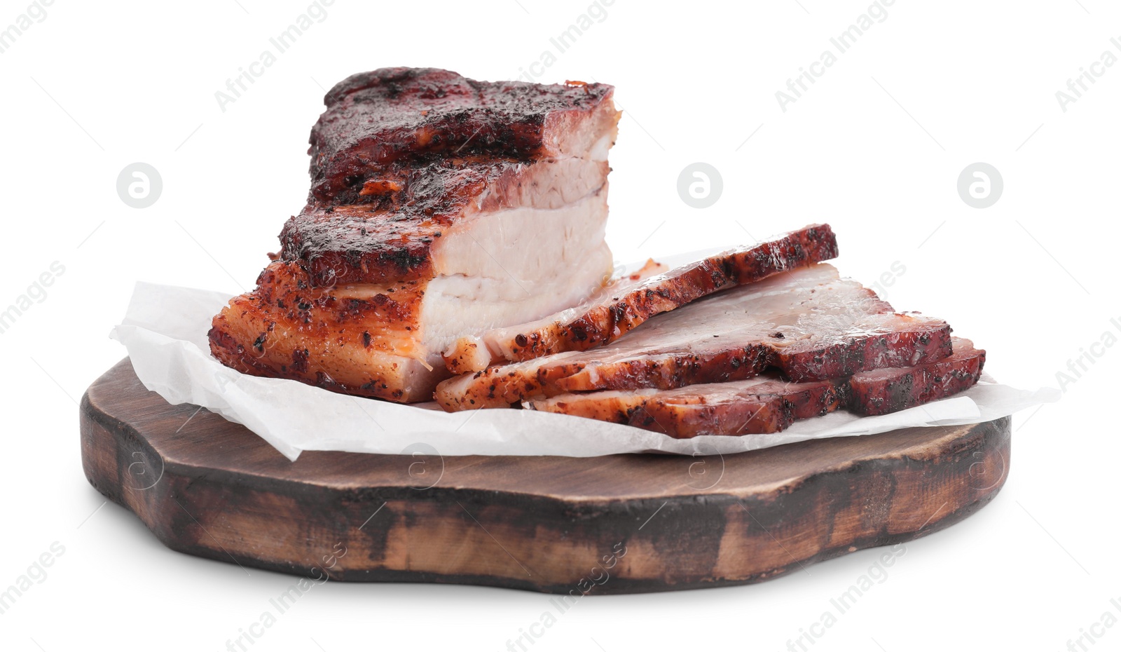 Photo of Pieces of tasty baked pork belly isolated on white