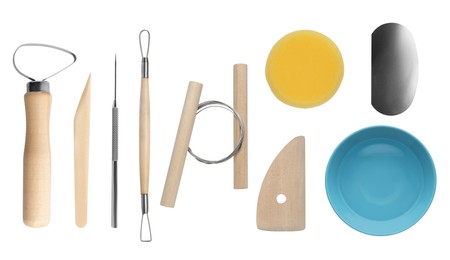 Image of Set of pottery tools and ceramic bowl on white background