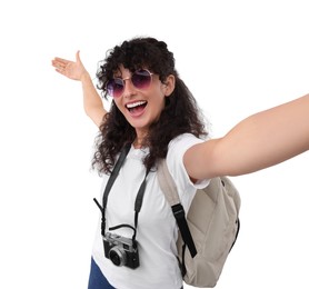 Photo of Beautiful woman in sunglasses with camera taking selfie on white background