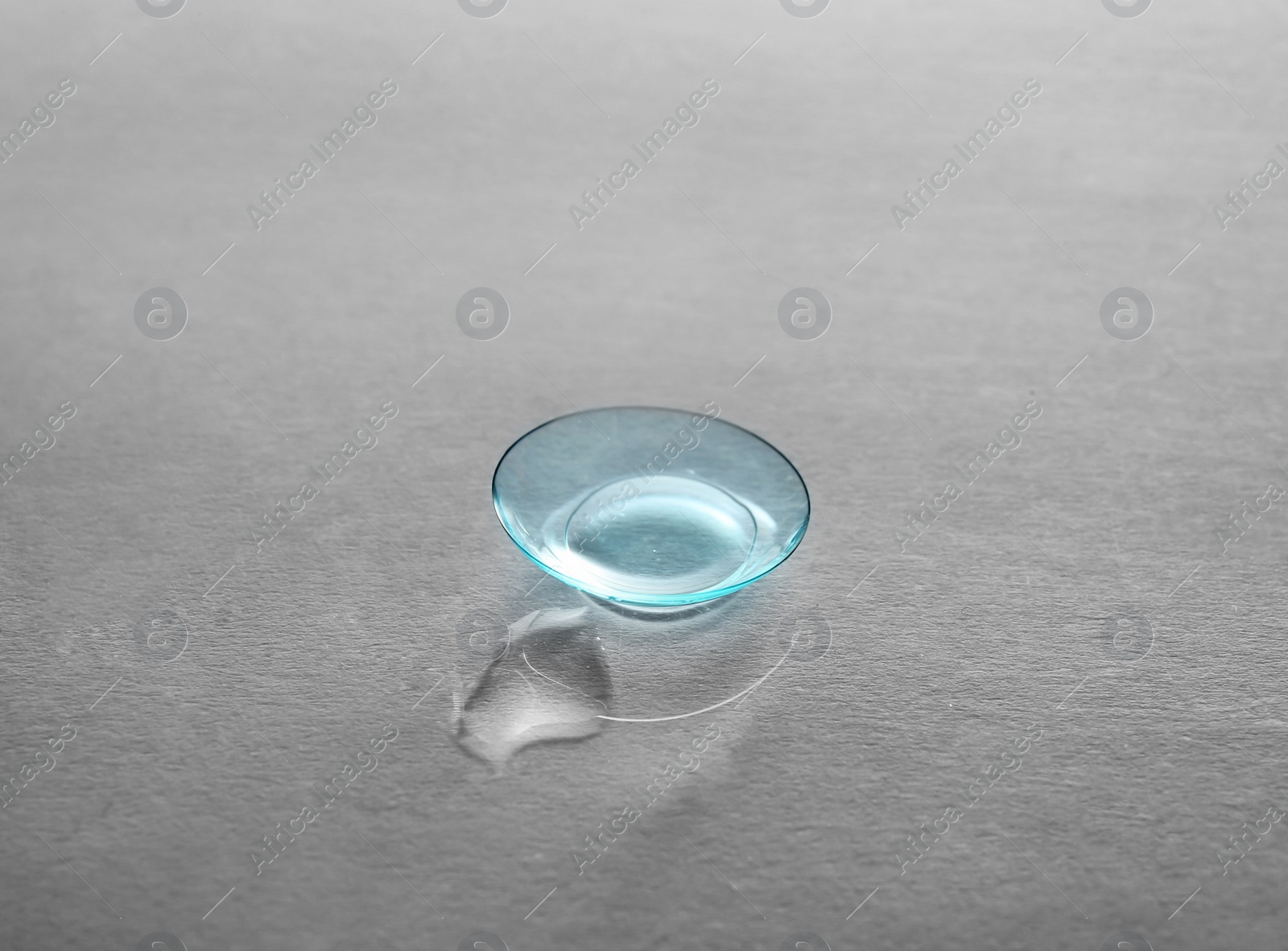 Photo of Contact lens on light background