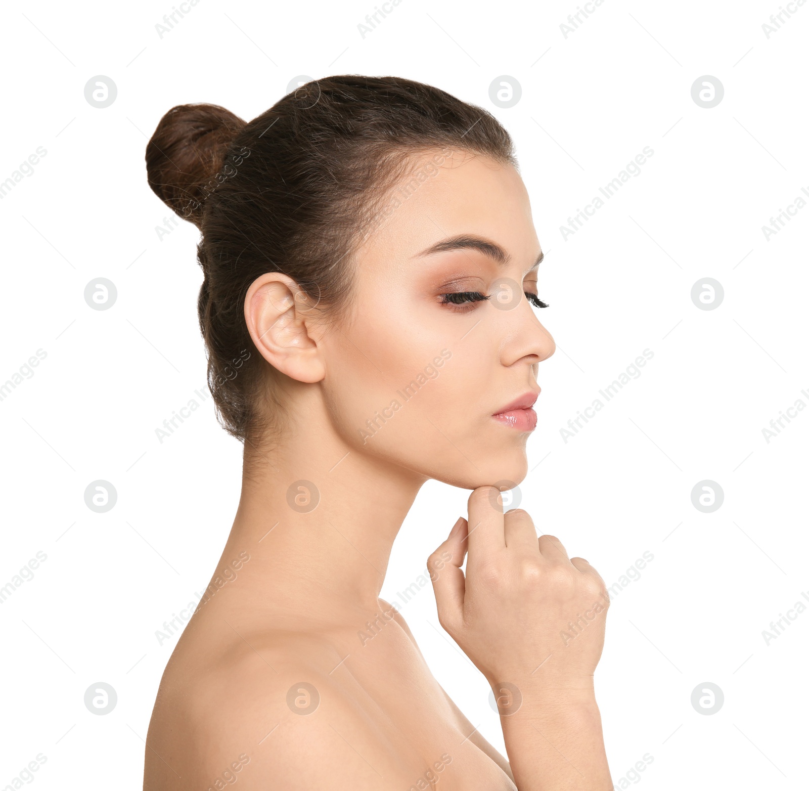 Photo of Young woman with beautiful makeup on white background. Professional cosmetic products