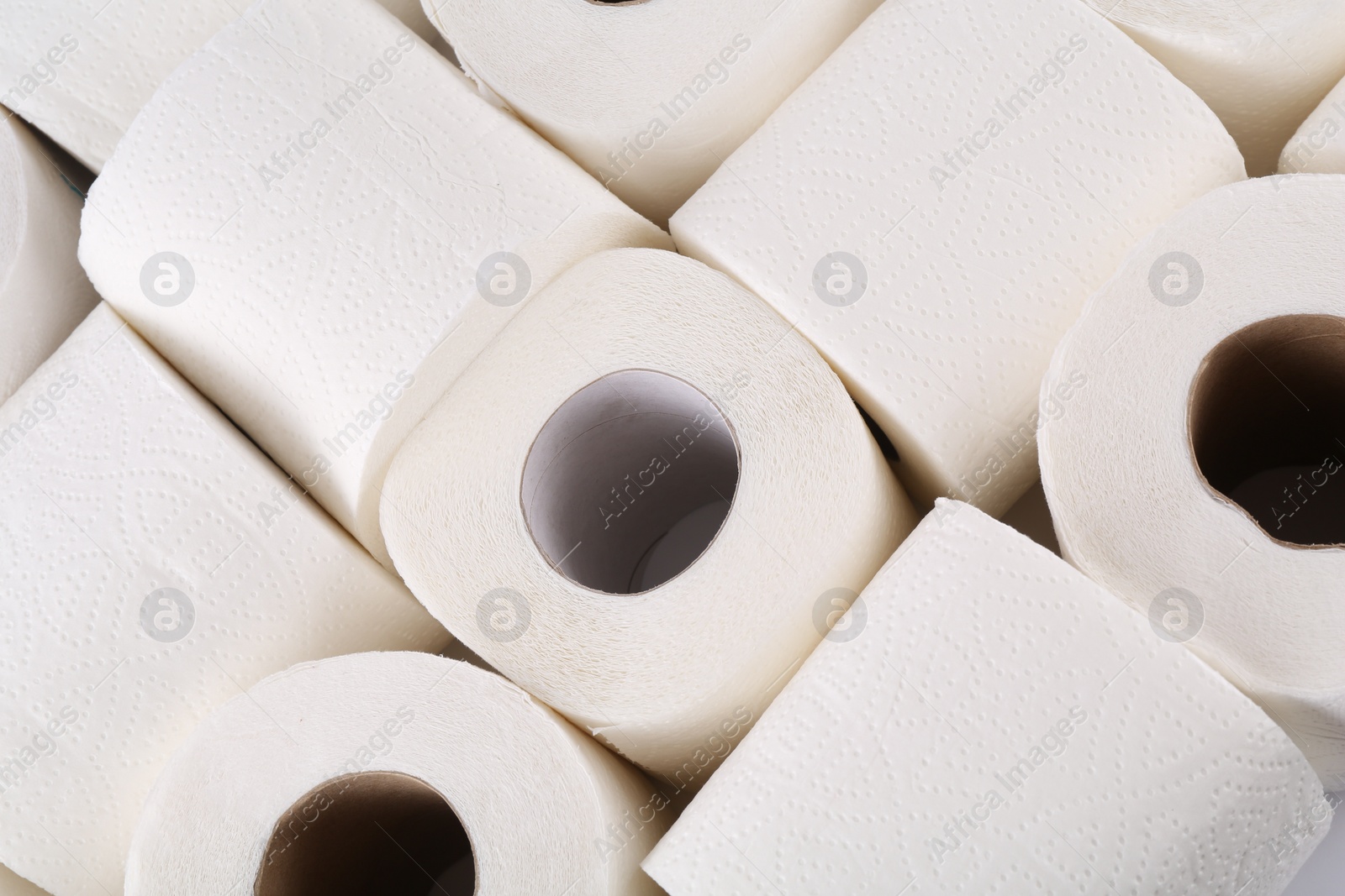 Photo of Many soft toilet paper rolls as background, above view