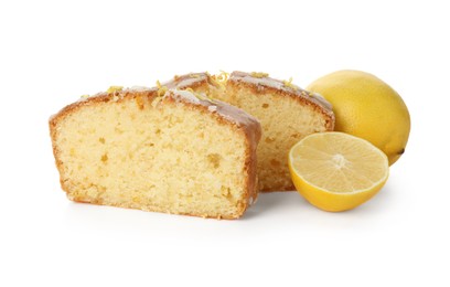 Photo of Pieces of tasty lemon cake with glaze and citrus fruits isolated on white