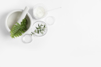 Photo of Organic cosmetic product, natural ingredients and laboratory glassware on white background, flat lay. Space for text