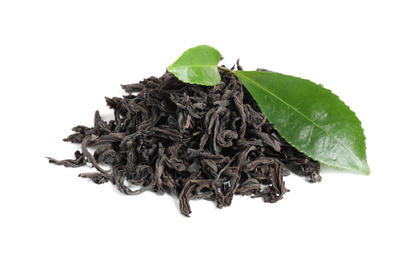 Photo of Fresh and dry leaves of tea plant on white background