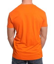 Photo of Man wearing orange t-shirt on white background, back view. Mockup for design