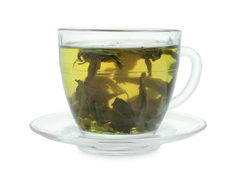 Fresh green tea in glass cup, leaves and saucer isolated on white