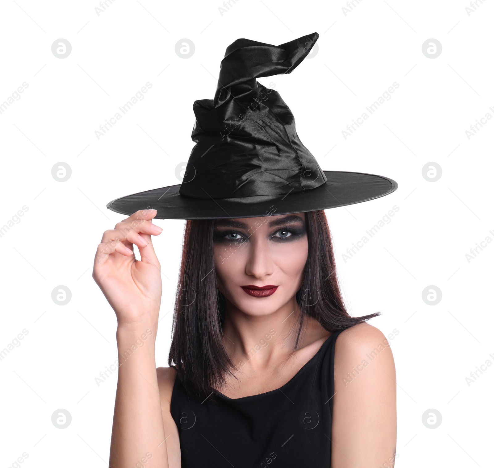 Photo of Mysterious witch wearing hat on white background