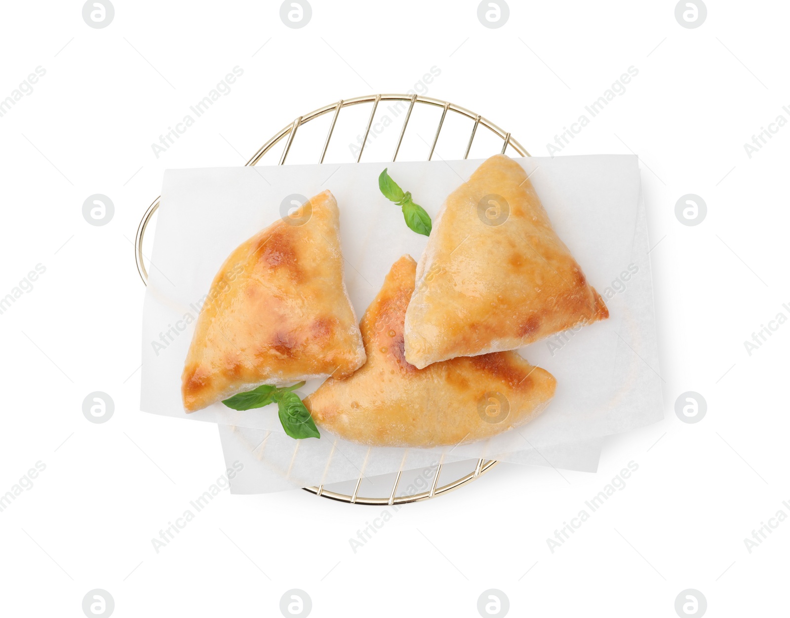 Photo of Delicious samosas and basil isolated on white, top view