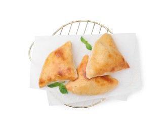 Photo of Delicious samosas and basil isolated on white, top view