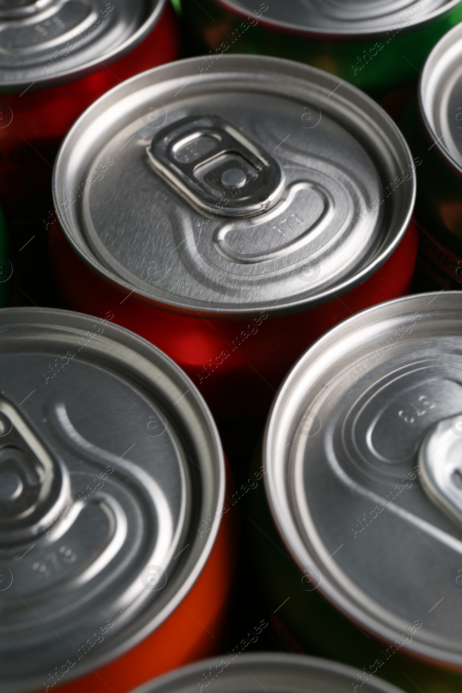Photo of Energy drink in cans, closeup. Functional beverage