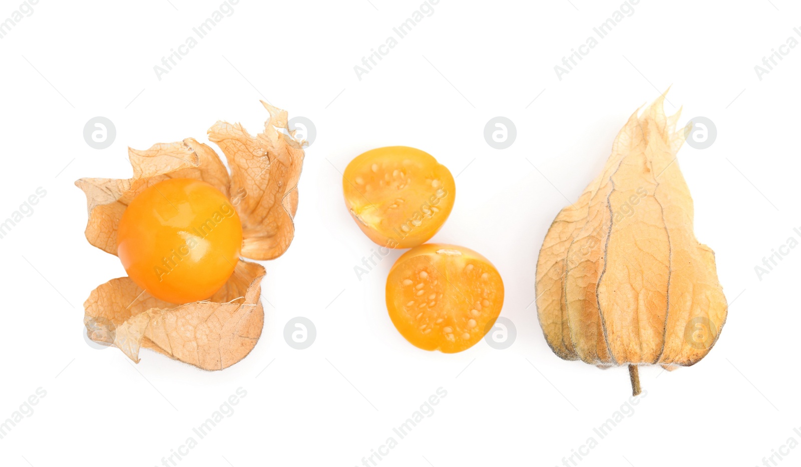 Photo of Cut and whole ripe physalis fruits with dry husk on white background, top view