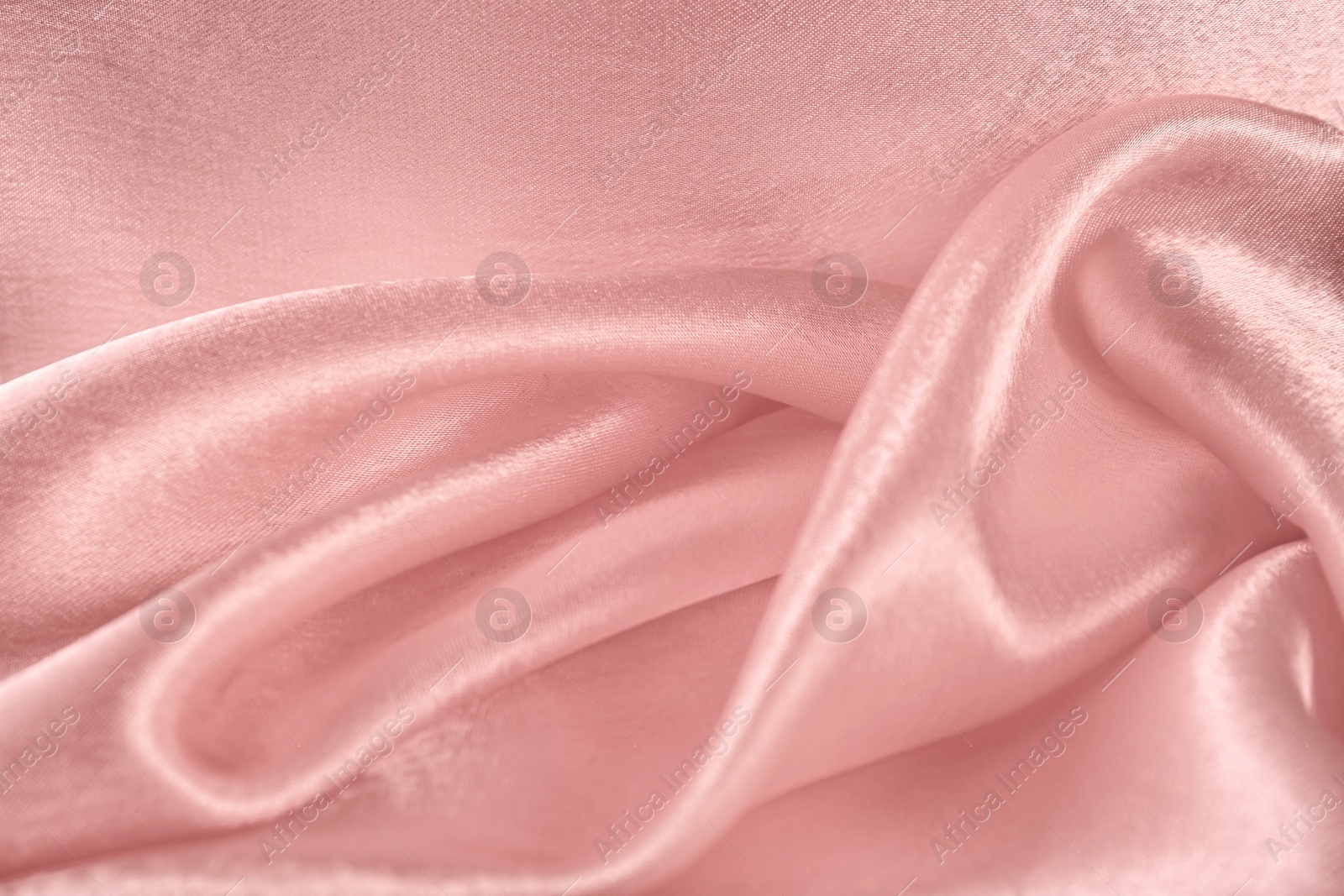 Photo of Texture of beautiful rose silk as background