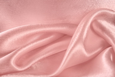 Texture of beautiful rose silk as background