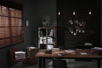 Detective office interior with evidence board on wall