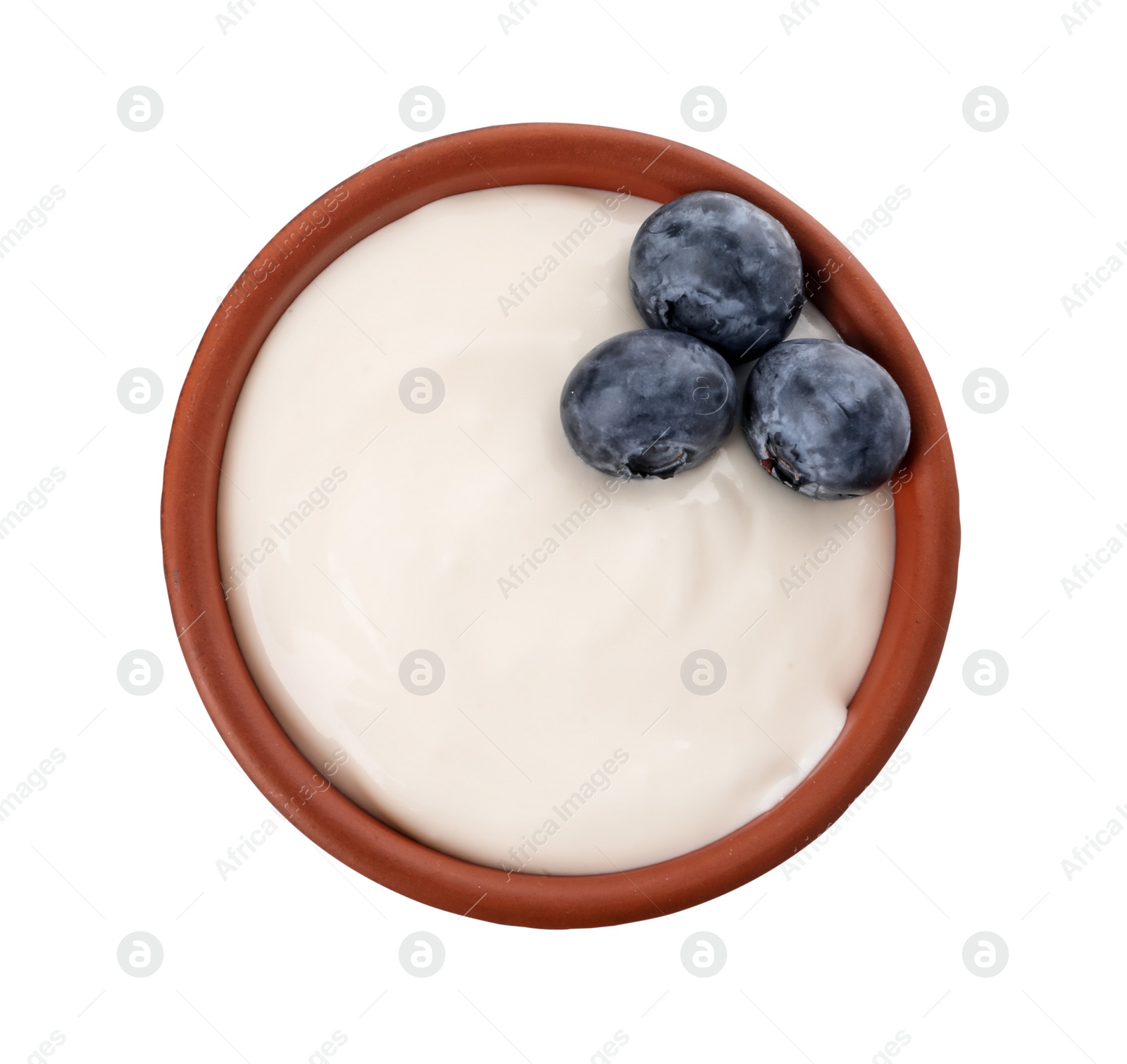 Photo of Bowl of delicious yogurt with blueberries isolated on white, top view