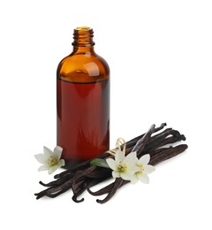 Bottle of essential oil, vanilla pods, green leaf and flowers isolated on white