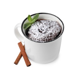 Tasty chocolate mug pie with mint and cinnamon sticks isolated on white. Microwave cake recipe