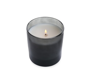 Photo of Burning wax candle in holder on white background