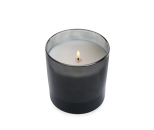 Burning wax candle in holder on white background