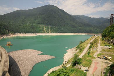 BATUMI, GEORGIA - AUGUST 13, 2022: View of beautiful landscape with river and mountains